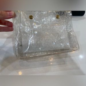 Dior clear makeup bag (with stains)